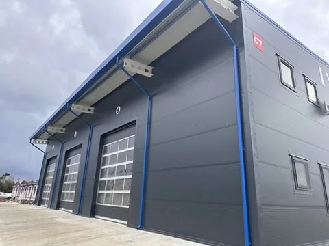 HALE DELTA INTERNATIONAL CONSTANȚA - fatada finalizata cu usi industriale